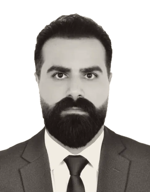 Portrait of Reza Shams in a suit and tie